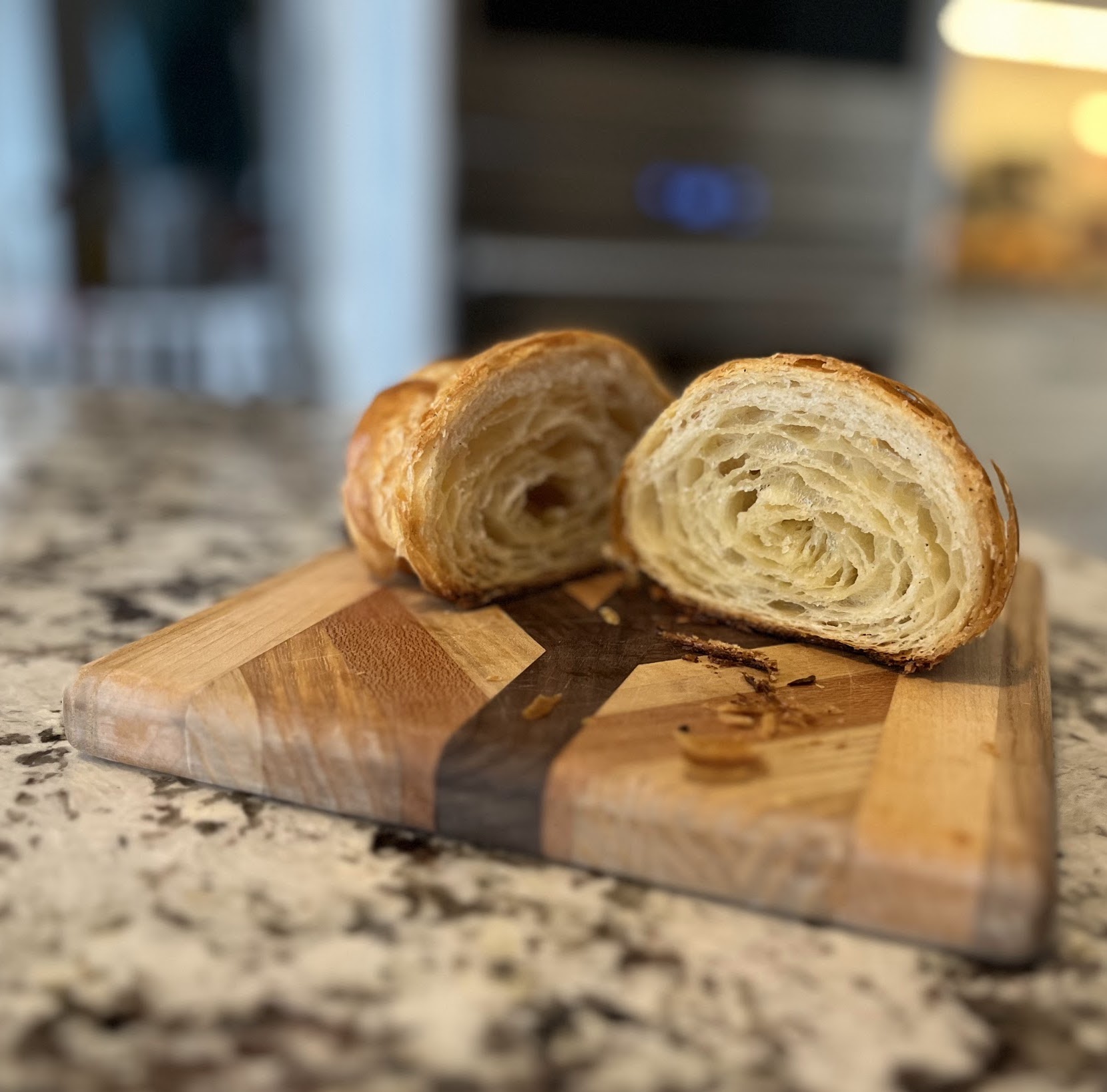 A picture of a croissant cut in half